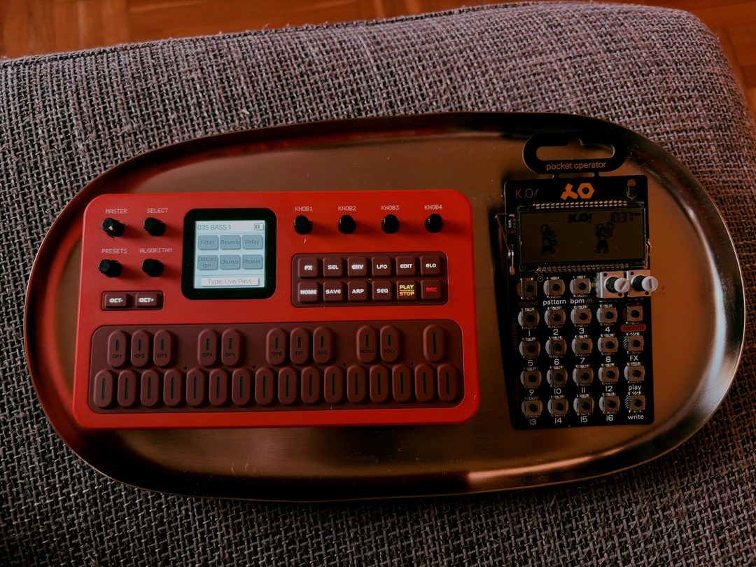 Photo of FM-1 and PO-33 sitting next to each other