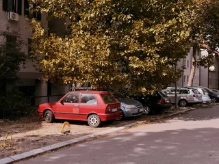 Photos of old red Yugoslavian car